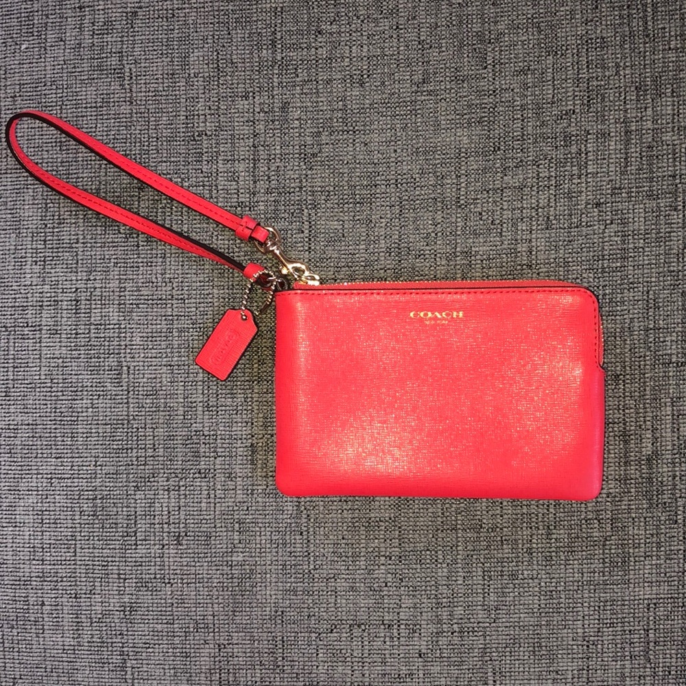 Salmon Colored Coach Wristlet
